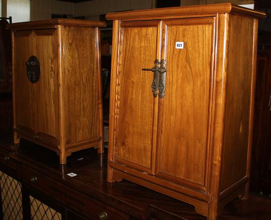 A pair of Chinese bedside cabinets